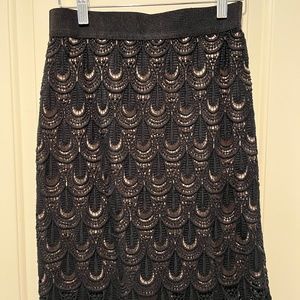 Ann Taylor 0P  black pencil skirt.  Knit overlay with taupe lining.  Very pretty